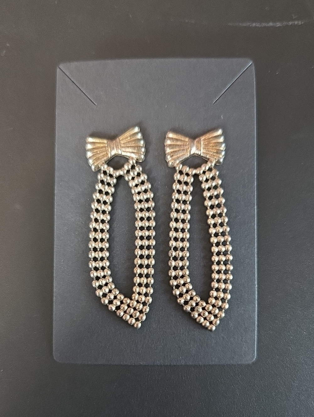 Silver Tone Bow Dangle Earrings